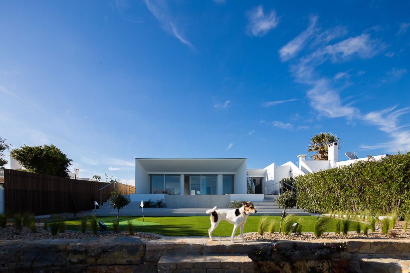 portuguese coast villa by CORE architects overlooks the ocean