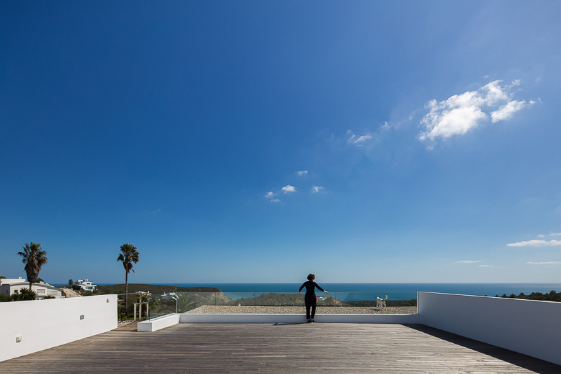 portuguese coast villa by CORE architects overlooks the ocean