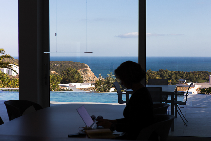 portuguese coast villa by CORE architects overlooks the ocean