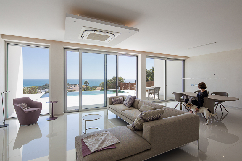 portuguese coast villa by CORE architects overlooks the ocean