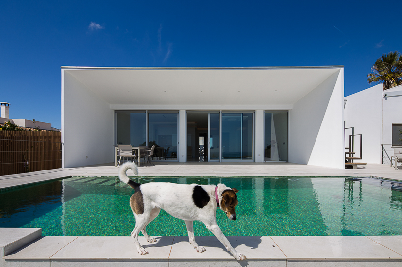 portuguese coast villa by CORE architects overlooks the ocean