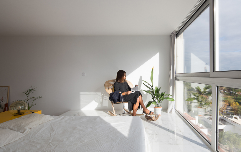 corpo atelier apartment in vilamoura vanishes the line between architecture and sculpture designboom