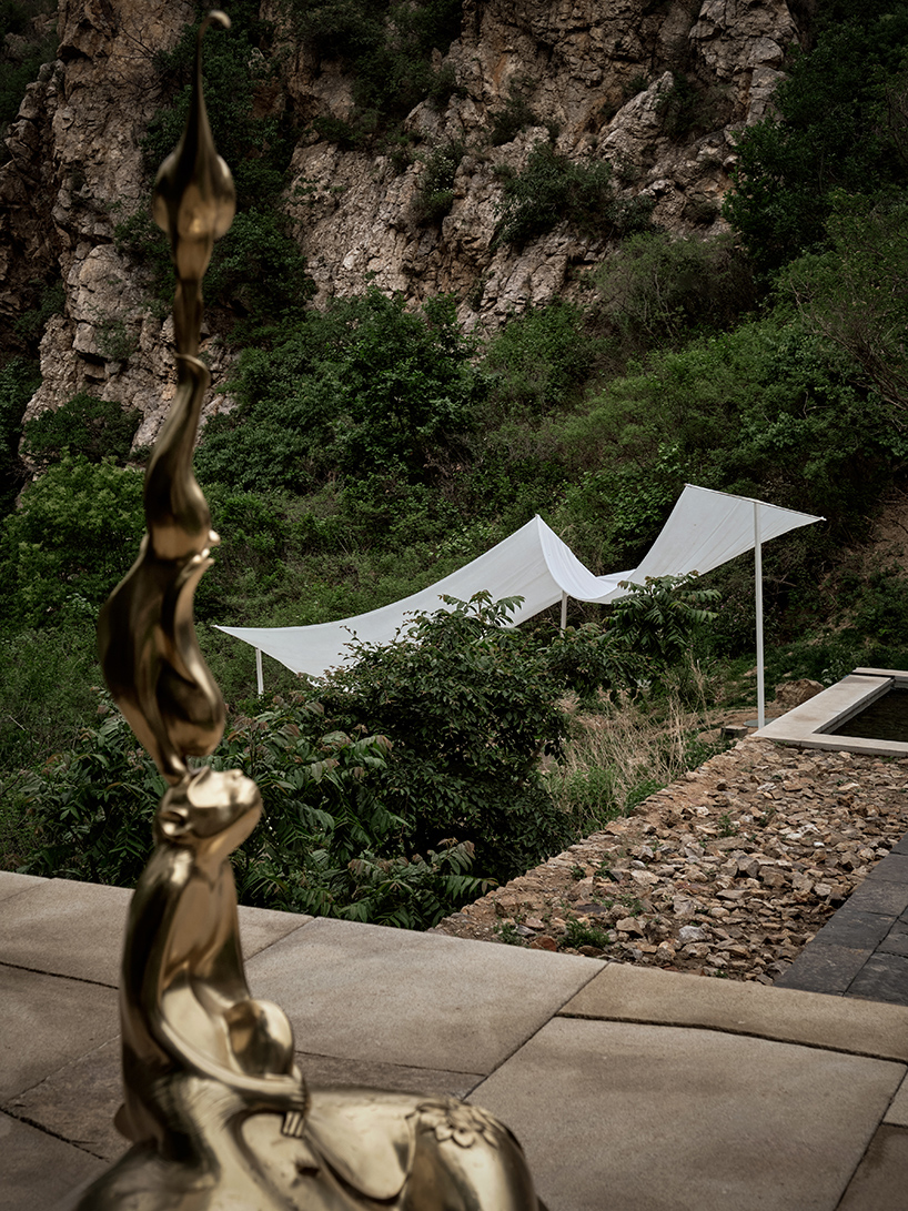 whispers of wind and steel the fans ethereal dialogue with jinshanlings ancient landscape 7