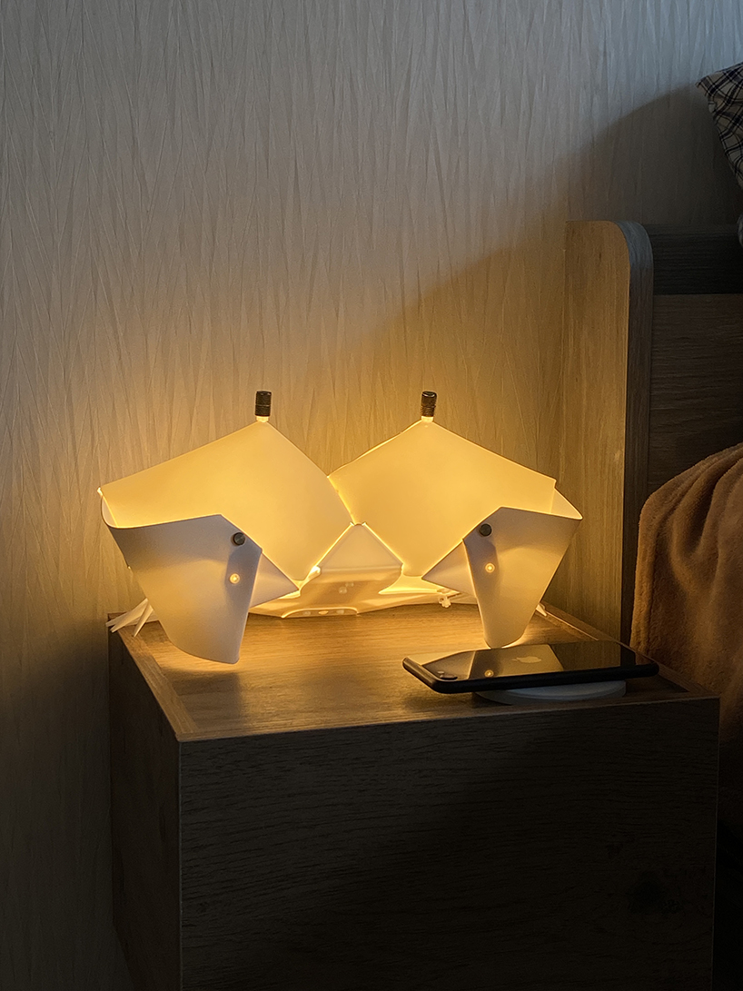 origami crab lamp folds into a softly glowing nightstand companion