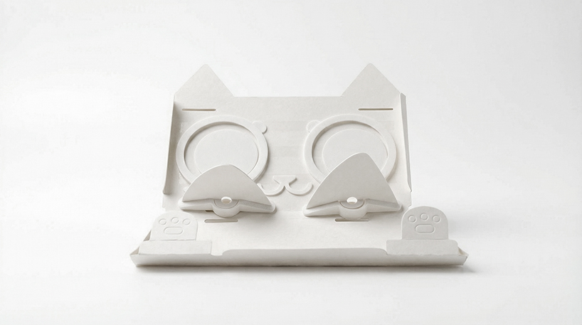 folding ears and face decorations turn robotic vacuum cleaners into small pet helpers