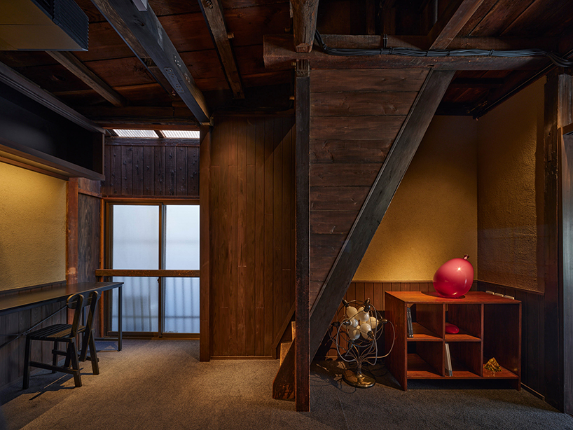 copper-plated facade enfolds renovated izutsuya gallery in tokyo