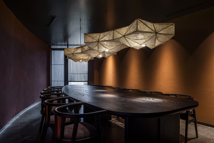 luminous origami-inspired steel roof by takashi niwa ornaments restaurant in vietnam