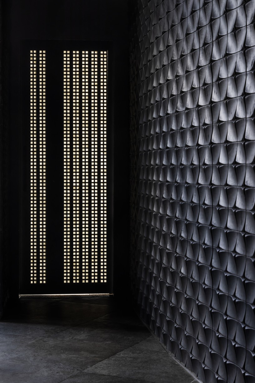 luminous origami-inspired steel roof by takashi niwa ornaments restaurant in vietnam