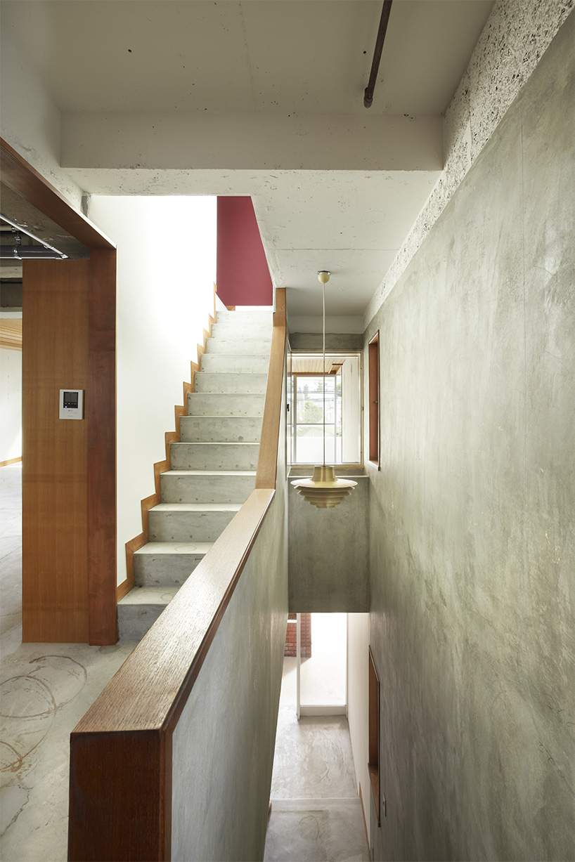 three-story building renovation in japan combines residential, retail ...