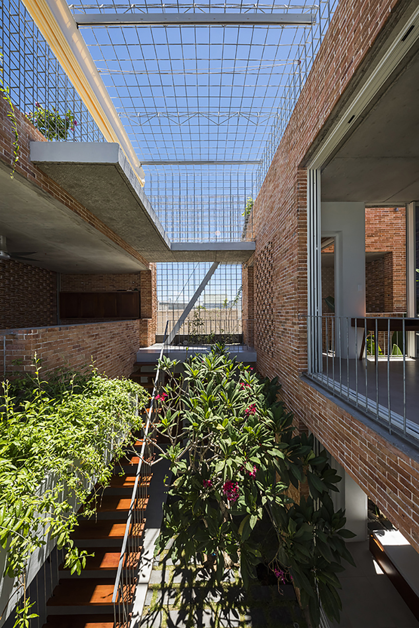studio happ designs house with internal garden to combat tropical climate in vietnam