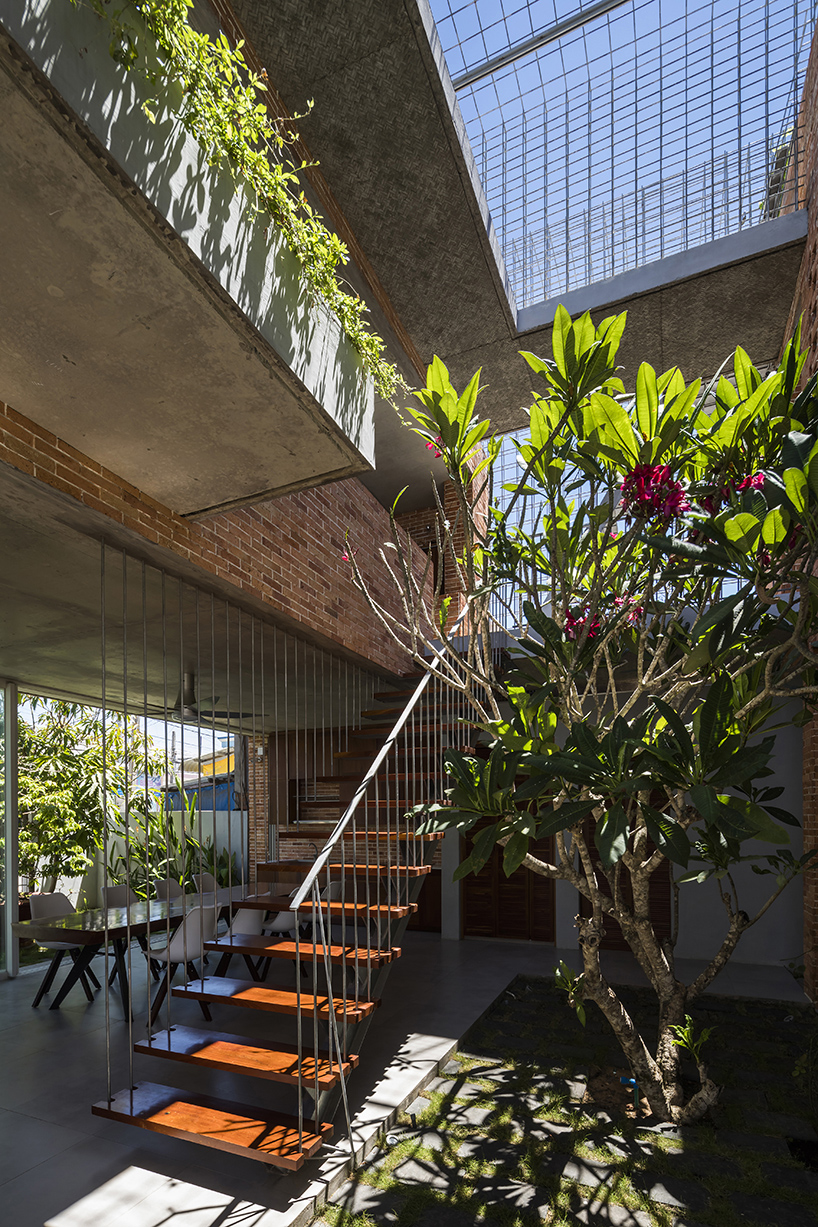 studio happ designs house with internal garden to combat tropical climate in vietnam