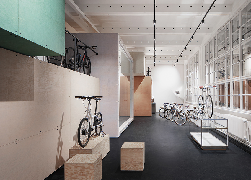 naice stacks wooden volumes inside old berlin factory for urban mobility startup?s offices