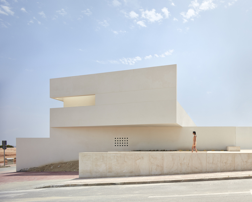 minimalist residential project by balzar and alcocer emerges from spanish landscape