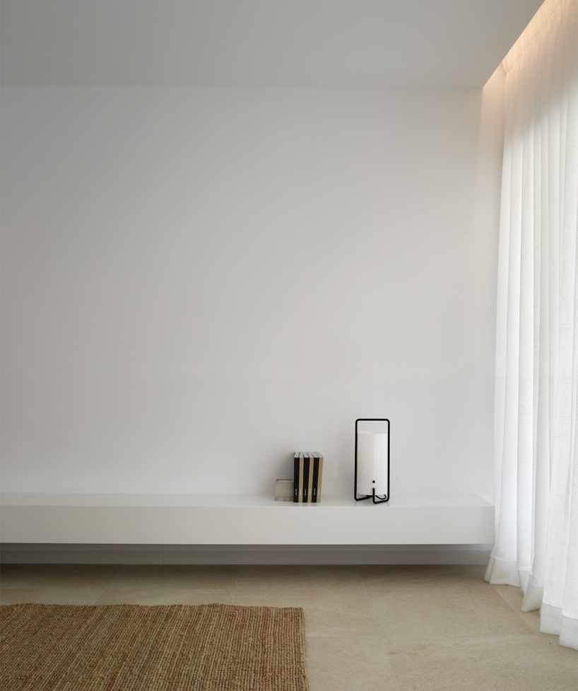 minimalist residential project by balzar and alcocer emerges from spanish landscape