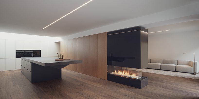 balzar adds scluptural curved staircase to residential renovation in spain