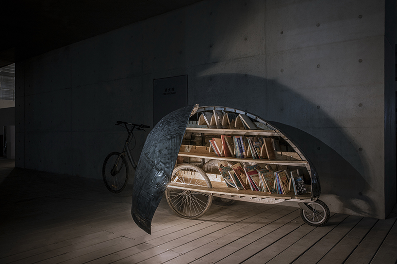 ladybird-like wings open to reveal micro movable library for children in china