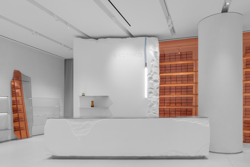 da bureau scatters white stone blocks into footwear concept store in moscow