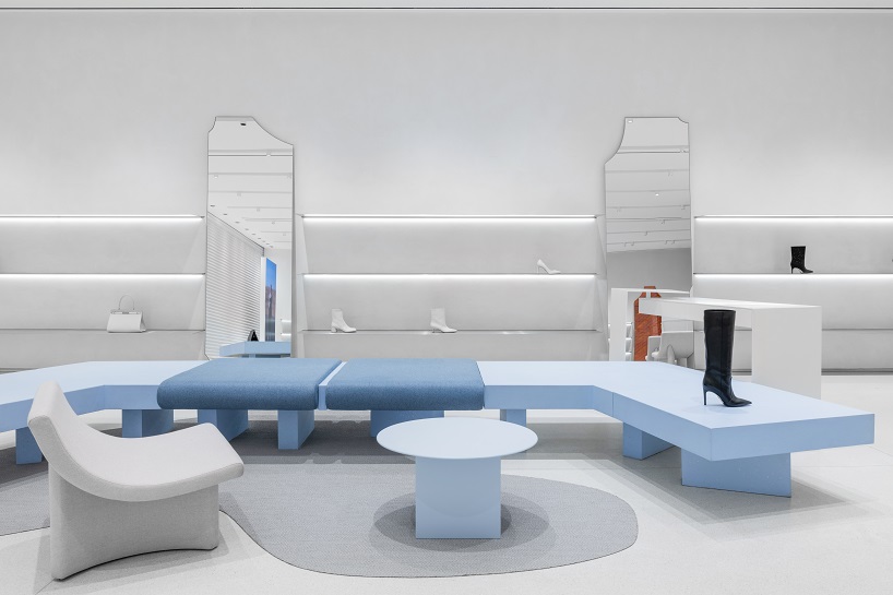 da bureau scatters white stone blocks into footwear concept store in moscow