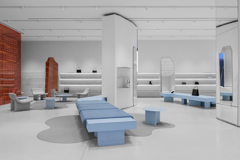 da bureau scatters white stone blocks into footwear concept store in moscow