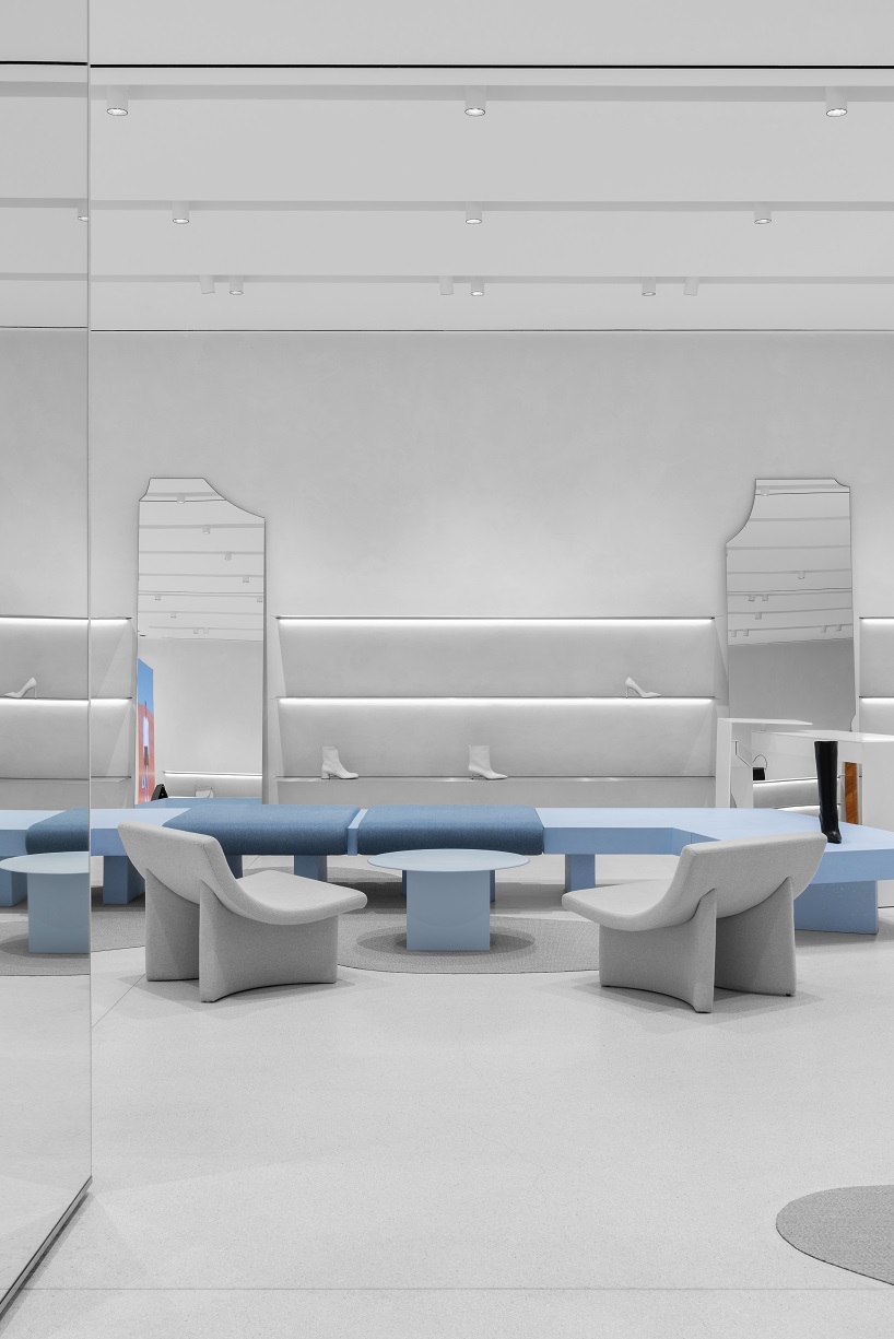 da bureau scatters white stone blocks into footwear concept store in moscow