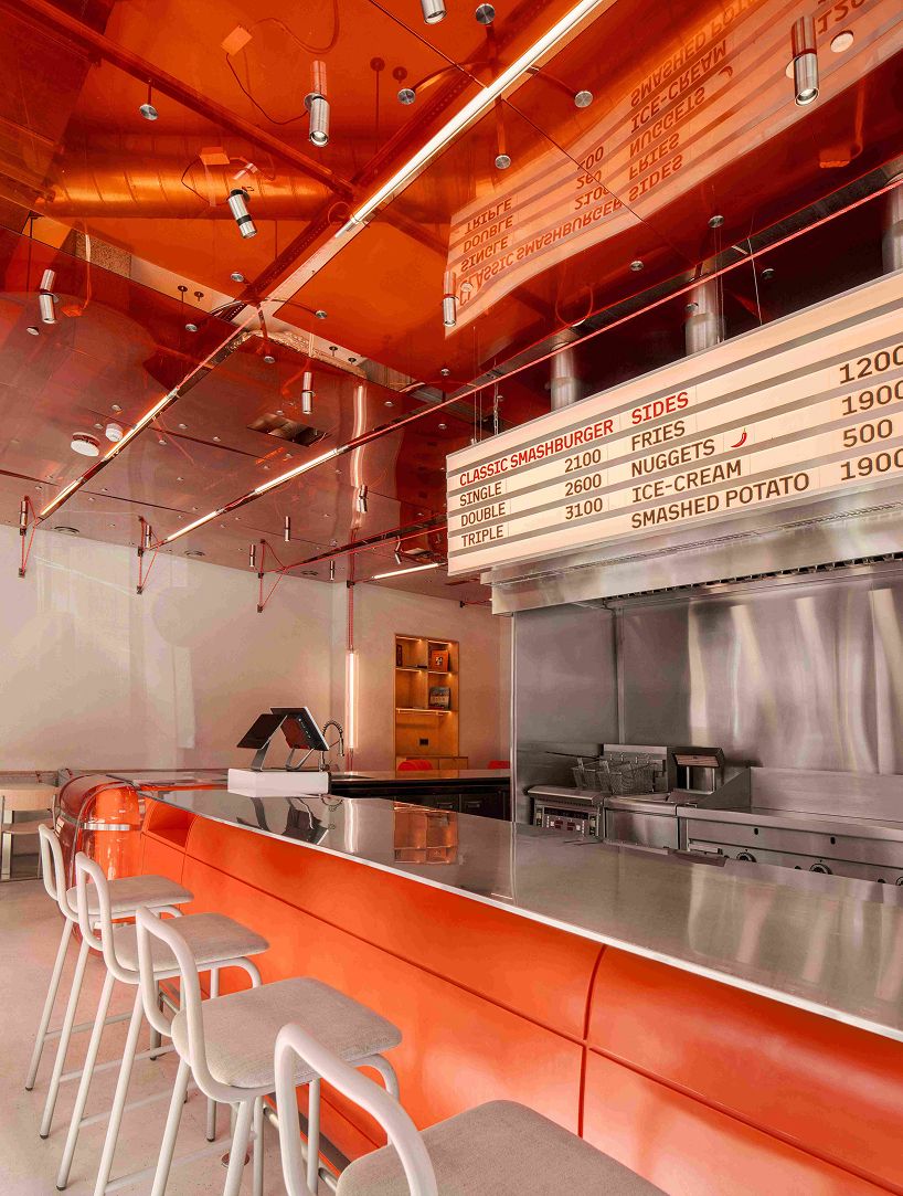inflated orange volumes adorn smash burger restaurant’s interior by da bureau in armenia - 4