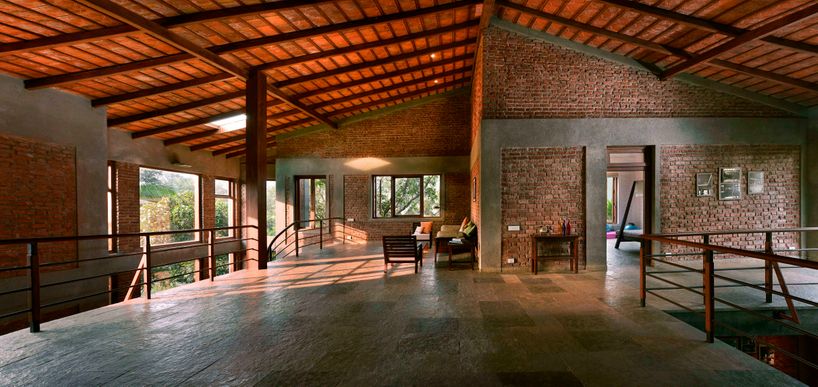 studio PKA's mango house uses earthy tones to reconnect with natural environment in india