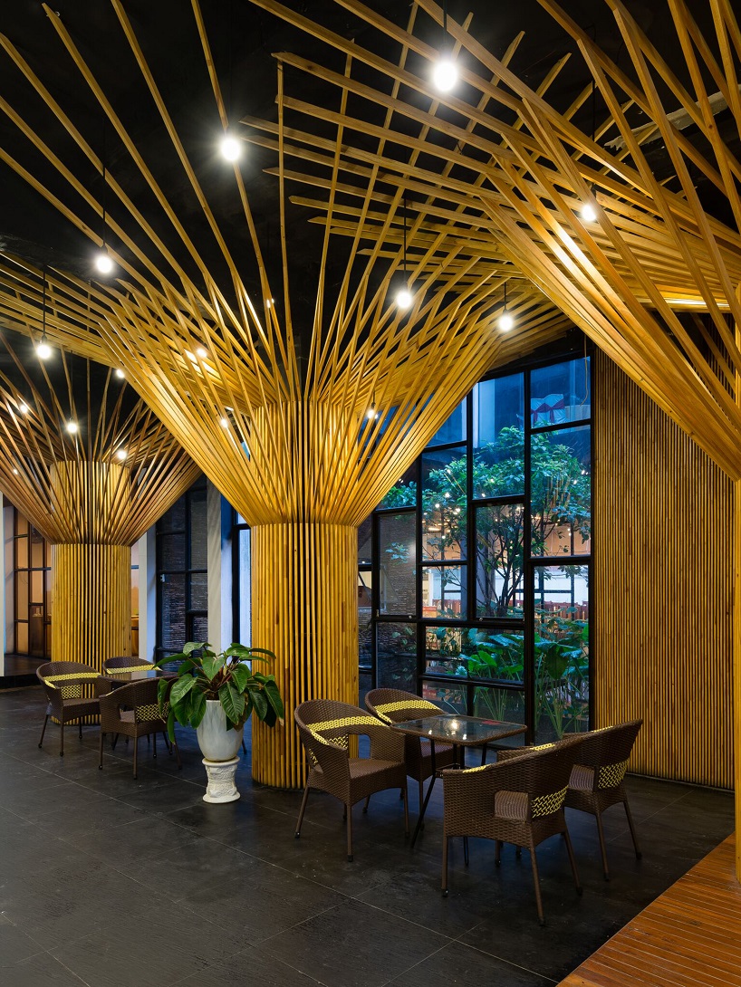 H2 uses reclaimed wood to design the sai gon thuong mai hotel in vietnam