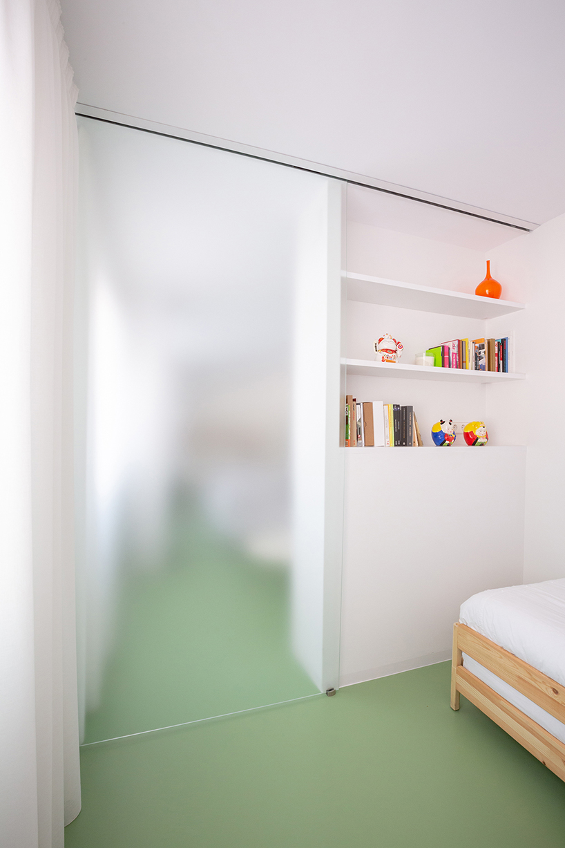 nada designs the picasso apartment in barcelona with a continuous green floor designboom