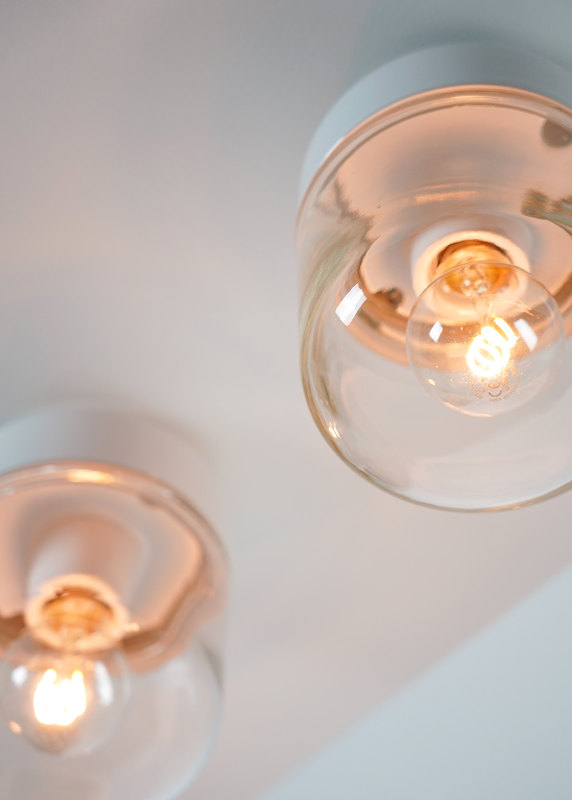 the growing 'ohm' porcelain light collection by kauppi & kauppi embraces the retrofit bulb