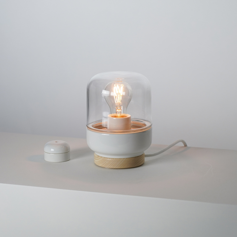 the growing 'ohm' porcelain light collection by kauppi & kauppi embraces the retrofit bulb