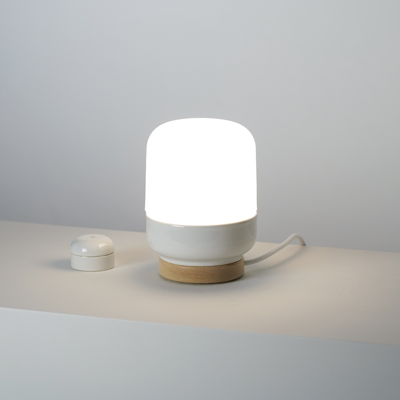 the growing 'ohm' porcelain light collection by kauppi & kauppi embraces the retrofit bulb