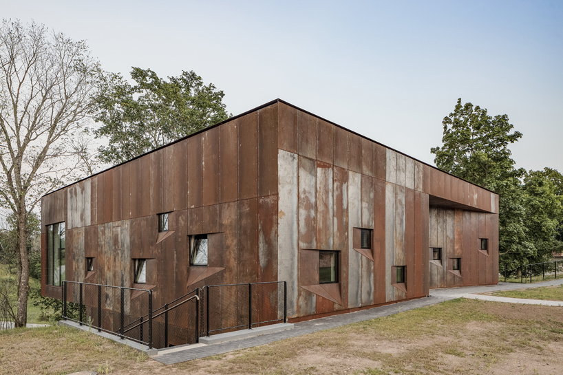  KAOS architects clads the pilgrims house with weathered 