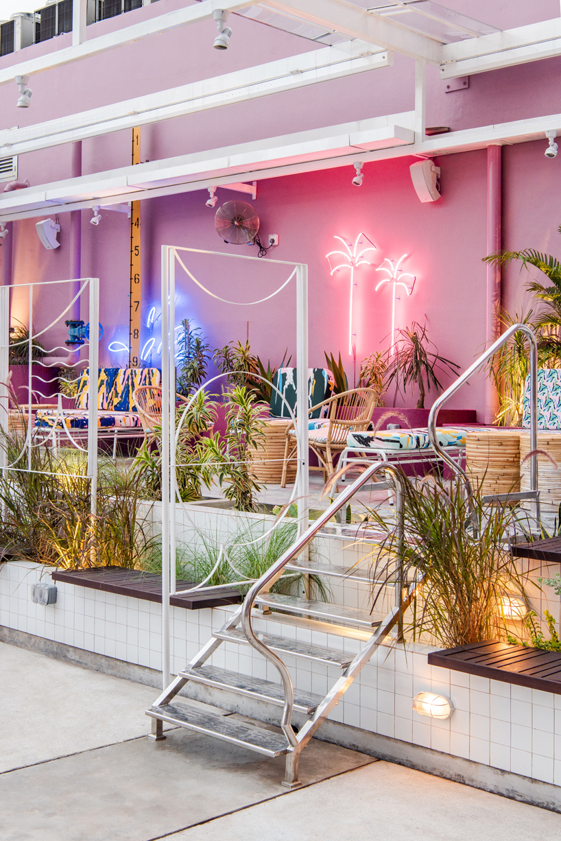 POW ideas captures retro neon style for the swimming club in kuala lumpur
