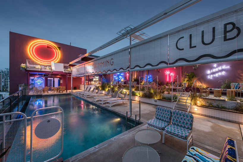 POW ideas captures retro neon style for the swimming club in kuala 