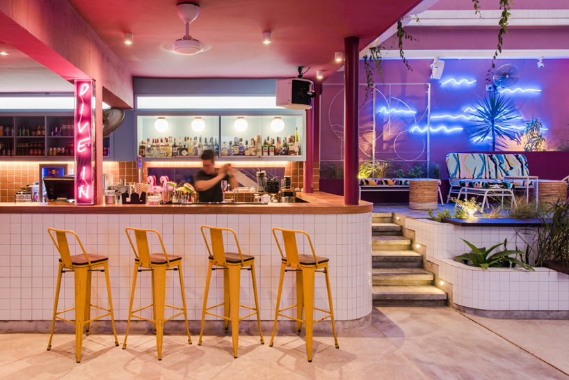 POW ideas captures retro neon style for the swimming club in kuala lumpur