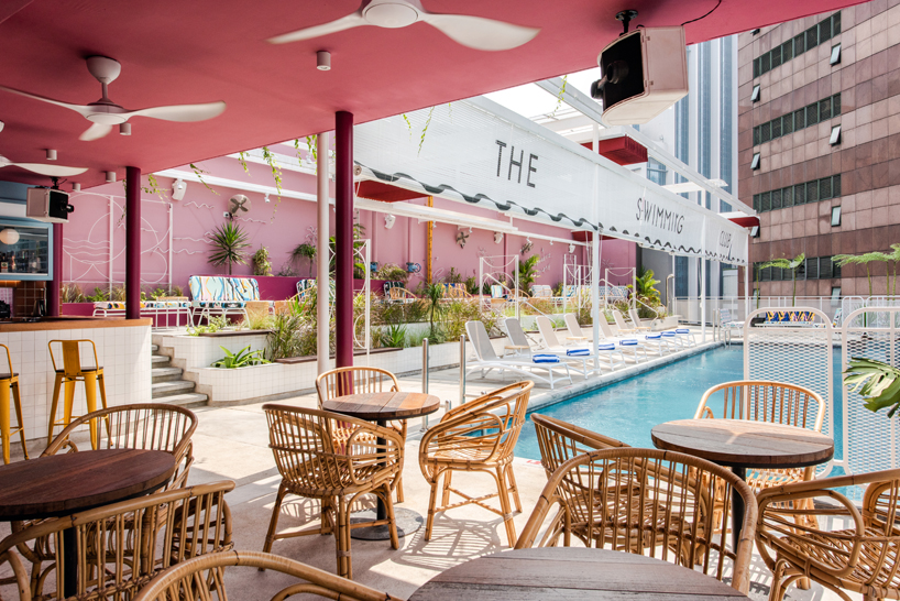 POW ideas captures retro neon style for the swimming club in kuala lumpur