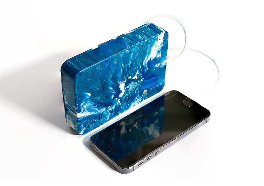gomi creates a portable charger made from 100% non-recyclable plastic waste designboom