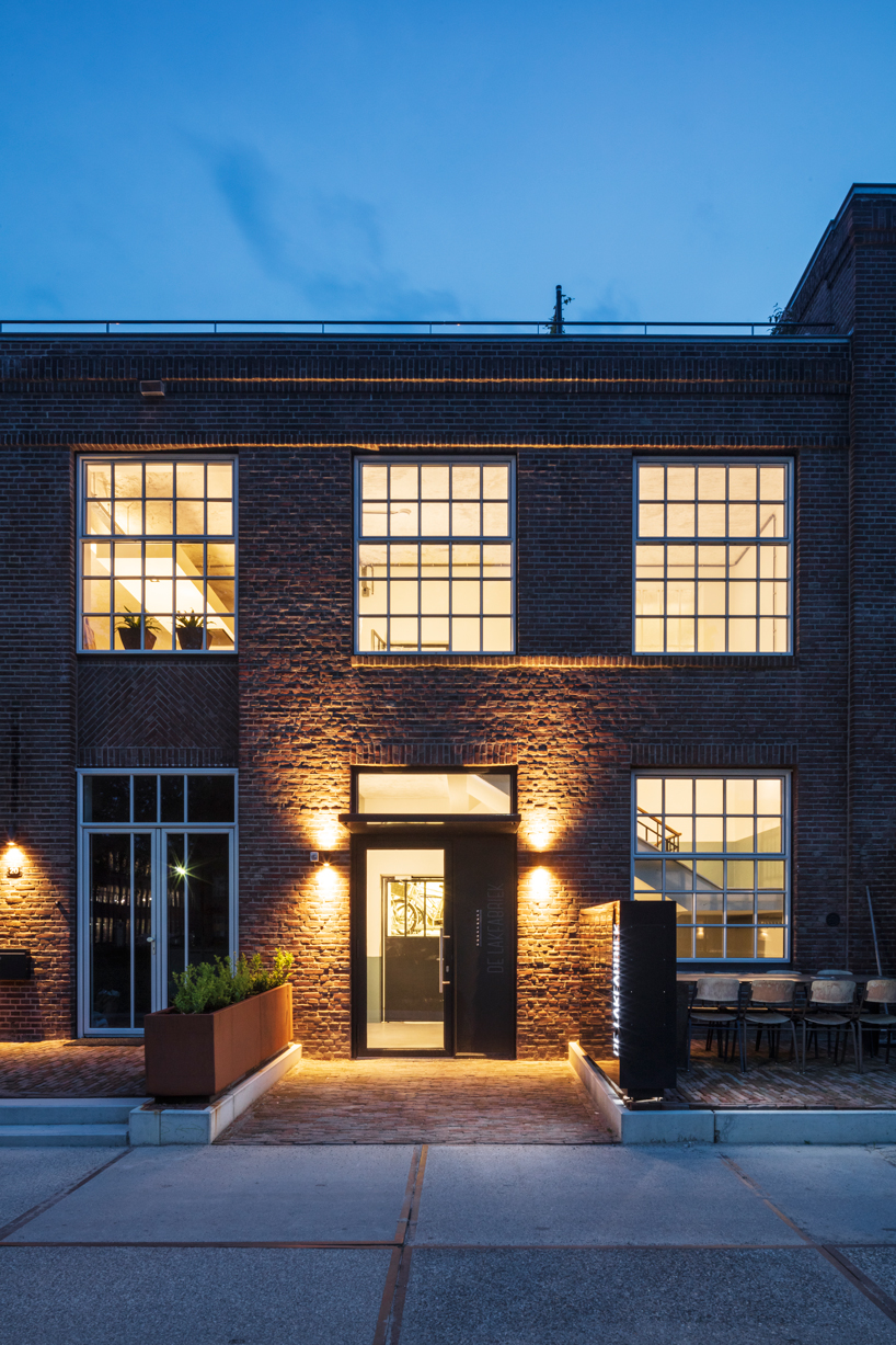 wenink holtkamp's factory conversion in the netherlands preserves industrial character designboom