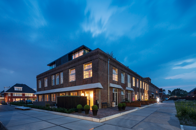 wenink holtkamp's factory conversion in the netherlands preserves industrial character designboom