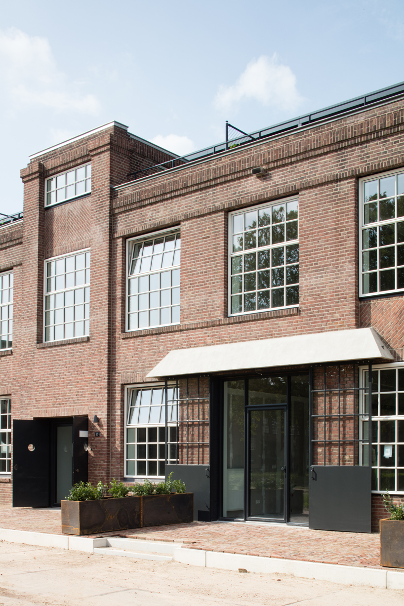 wenink holtkamp's factory conversion in the netherlands preserves industrial character designboom