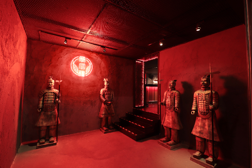 another tales applies red brick and metal finishes to the madam wong bar in malaysia designboom