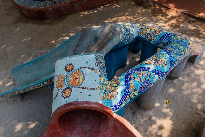 reclaimed materials sculpt textured children’s play structures in india public park