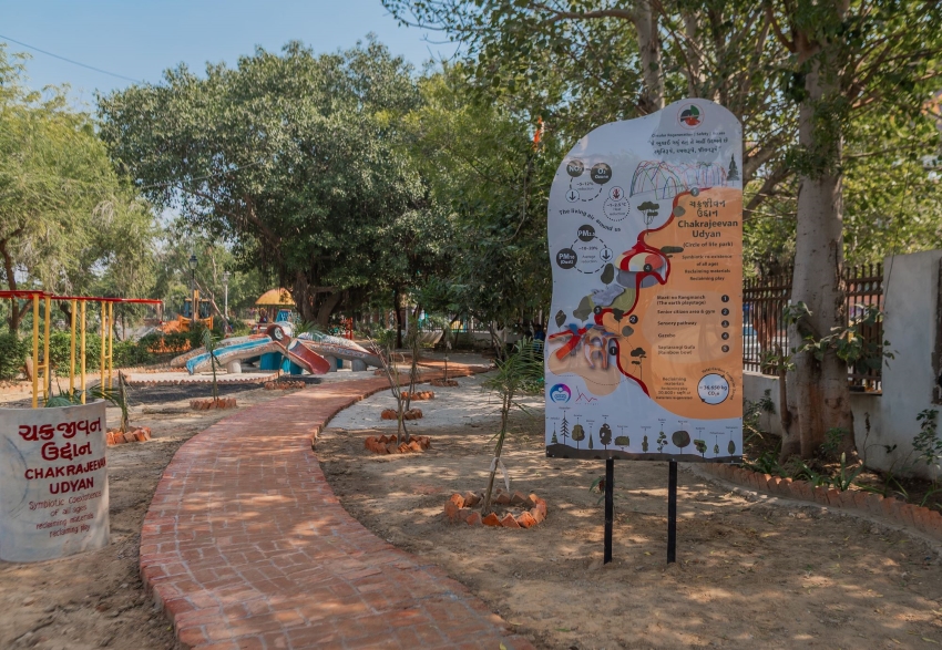 reclaimed materials sculpt textured children’s play structures in india public park