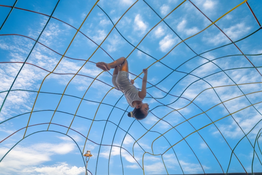 reclaimed materials sculpt textured children’s play structures in india public park