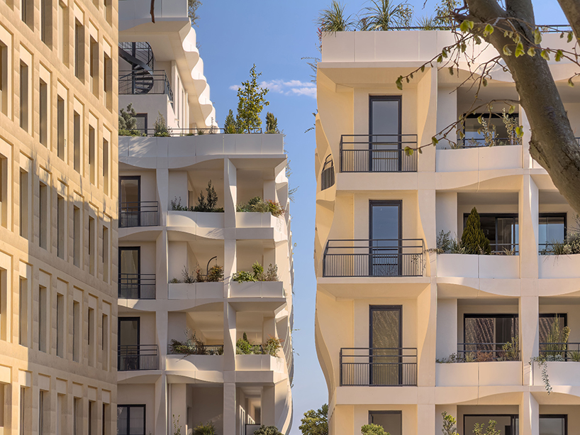 curved shell-like facades enfold montpellier residential units by vincent callebaut - 4