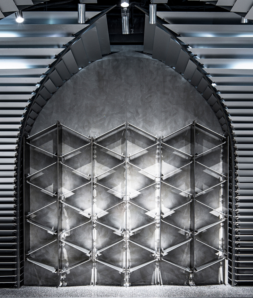 dongqi architects creates metal clad columns for concept store renovation in shanghai designboom