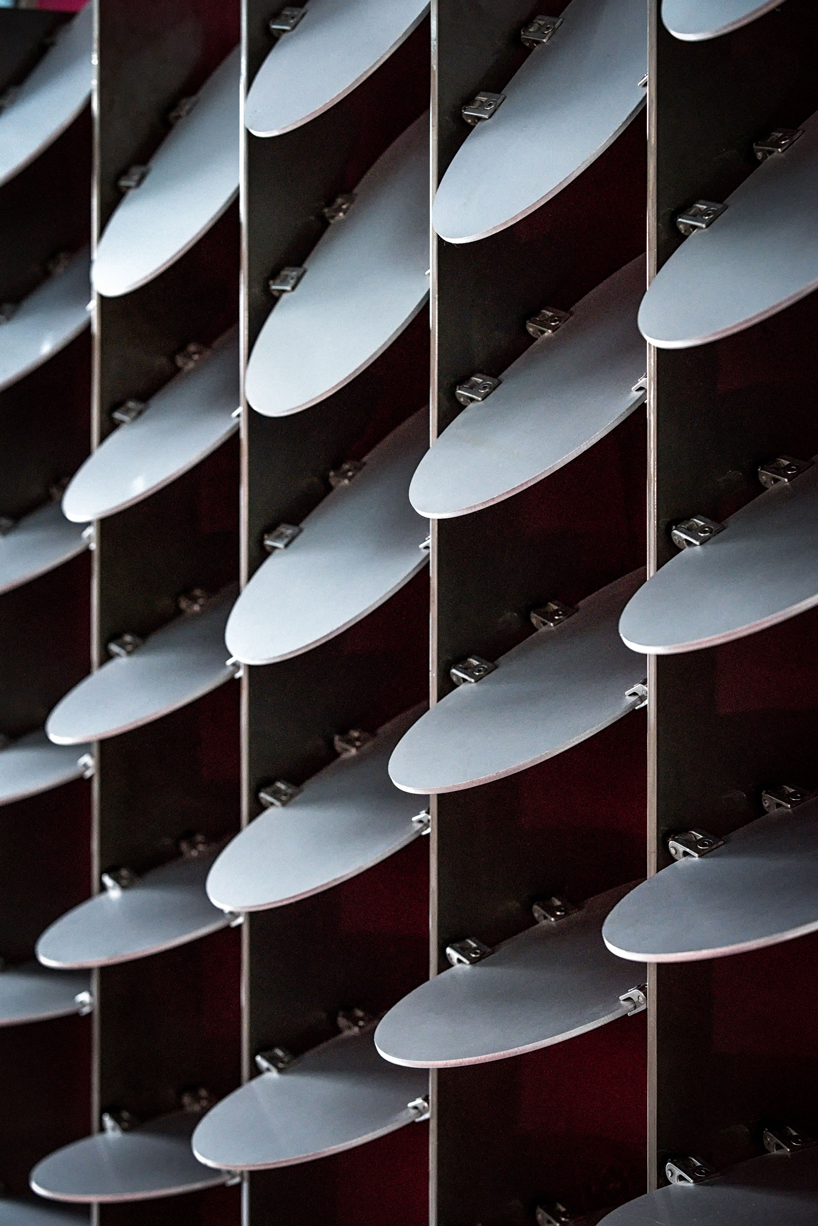 dongqi architects creates metal clad columns for concept store renovation in shanghai designboom