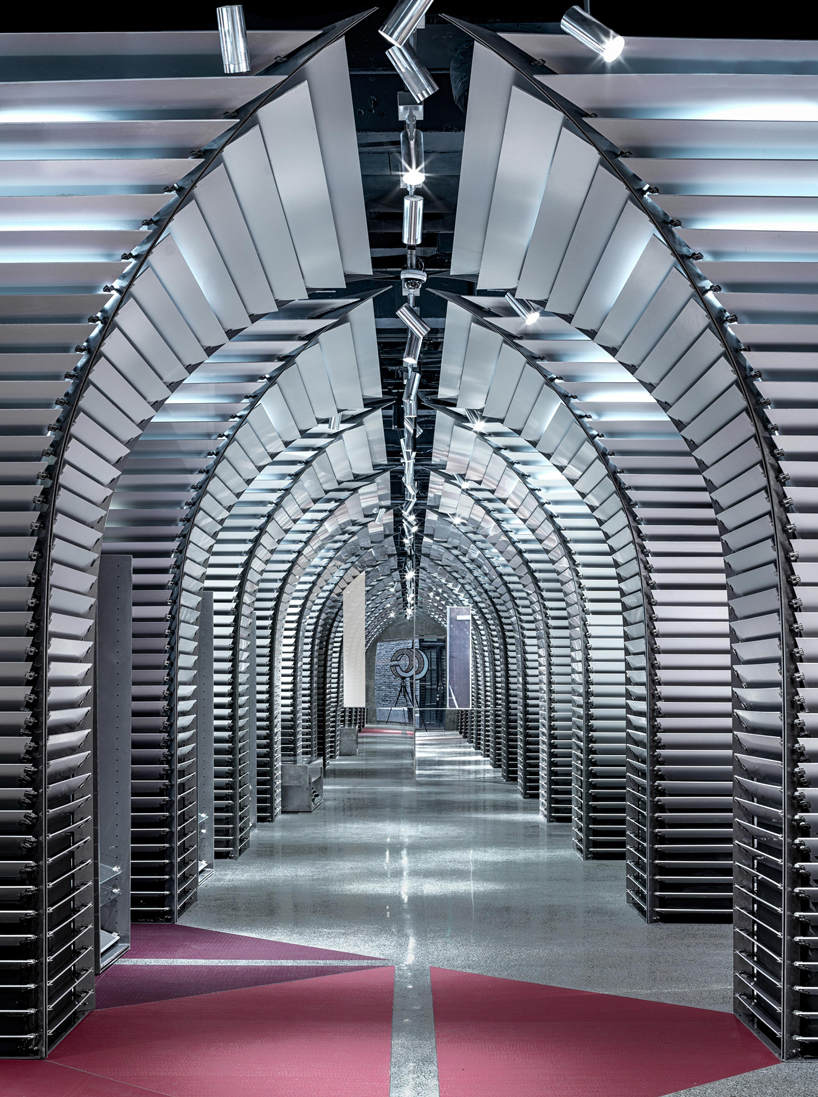 dongqi architects creates metal clad columns for concept store renovation in shanghai designboom