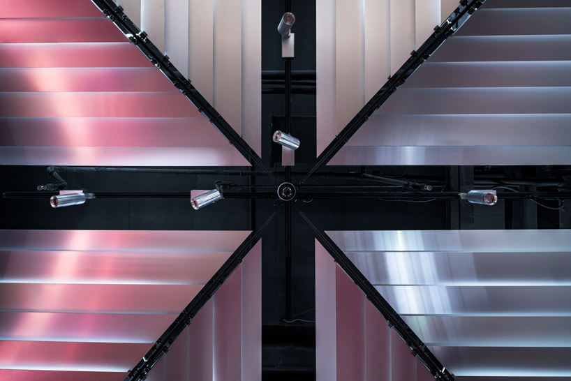 dongqi architects creates metal clad columns for concept store renovation in shanghai designboom