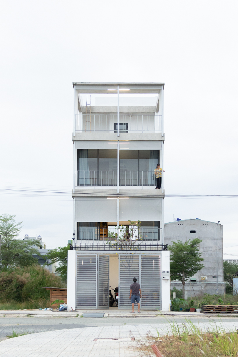 semi-transparent blinds cover the narrow front of 2713 house in vietnam